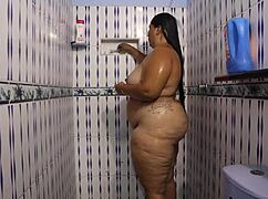 steamy milf shower reveals huge latina tits and tight wet pussy curves