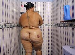 steamy milf shower reveals huge latina tits and tight wet pussy curves