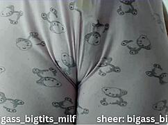 her juicy cameltoe swells as she spreads those fat pussy lips wide