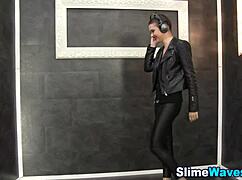 classy european babe in heels strokes her toy to messy climax behind gloryhole