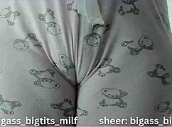 her juicy cameltoe swells as she spreads those fat pussy lips wide