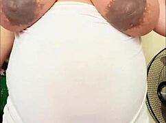 pregnant arab big belly milks her huge tits solo