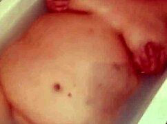 naked bbw milf fingers her big wet pussy deep in bathtub