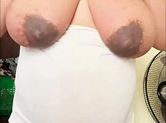 pregnant arab big belly milks her huge tits solo