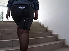 hey, check these fat juicy legs in nylon pantyhose under her skirt in the mall...