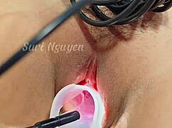 Peering inside vietnamese babe's tight wet pussy during steamy gyno exam