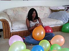 Watch My Huge Ebony Tits Heave As I Inflate Balloons In Fetish Frenzy