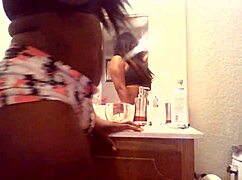 young cutie dances seductively in bathroom shaking to thug beats