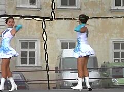 Two Busty Cheerleader Majorettes Show Off Assets