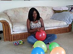 Watch My Huge Ebony Tits Heave As I Inflate Balloons In Fetish Frenzy