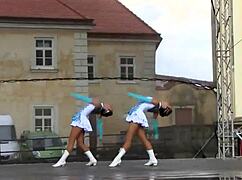 Two Busty Cheerleader Majorettes Show Off Assets