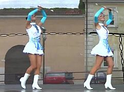 Two Busty Cheerleader Majorettes Show Off Assets