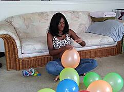 Watch My Huge Ebony Tits Heave As I Inflate Balloons In Fetish Frenzy