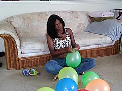 Watch My Huge Ebony Tits Heave As I Inflate Balloons In Fetish Frenzy
