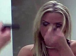 Blonde Prostitute Applies Makeup In Seductive Close-Up Tease