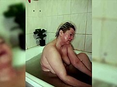 Aimee shaves her hairless milf pussy then jerks off in steamy bathroom close-up!