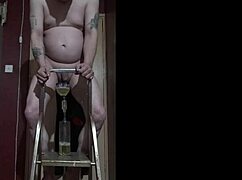 bisexual dude climbs ladder naked pisses bottle drinks every drop