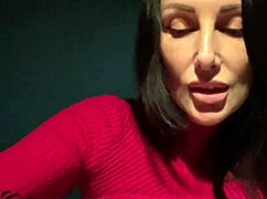 oh man, this horny milf's stroking her wet pussy in the club toilet