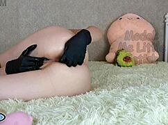 stepsis pisses in latex gloves buttplug ass big clit rub