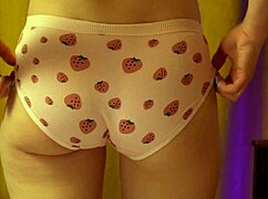 Her Pulsing Desire for Strawberry Panties Clinging to Round Curvy Ass
