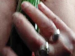 granny rams cucumber deep into hairy wet pussy