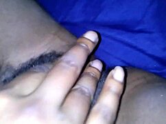 Ebony Jessica Grabbit teases hairy pussy with rabbit toy in highlights.