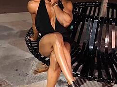 Erotic female bodybuilder babe flexes her muscular power in hot display