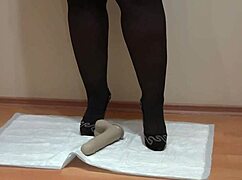 A plump mistress's hairy pussy squirts urine on dildo in heels domination