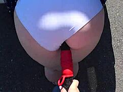 gf straps on to pound milf's fat ass outdoors by the car pov