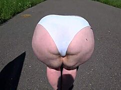 gf straps on to pound milf's fat ass outdoors by the car pov