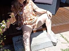 mature blonde cougar wife flashes her huge shaved pussy lips and big vulva while sunning in thong dress homemade exhibitionist spread