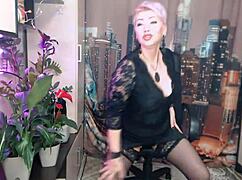 Watch this mature Russian whore ride cock cowgirl shaking her big tits wild