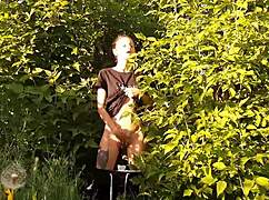 brunette risks public orgasm masturbating pussy in wild nature