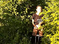 brunette risks public orgasm masturbating pussy in wild nature