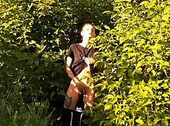 brunette risks public orgasm masturbating pussy in wild nature