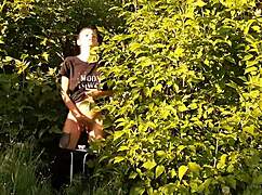 brunette risks public orgasm masturbating pussy in wild nature