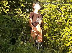 brunette risks public orgasm masturbating pussy in wild nature