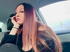 Hey, Italian milf Artemisia smokes cigs flashing big tits nipples in car.