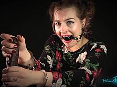 Bound milf housewife chokes on dildo in handcuff roleplay