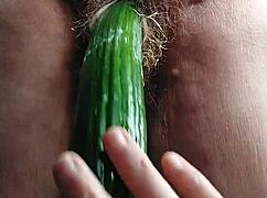 granny slut fucks hairy old pussy deep with huge cucumber