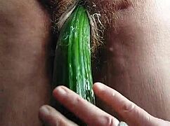 granny slut fucks hairy old pussy deep with huge cucumber