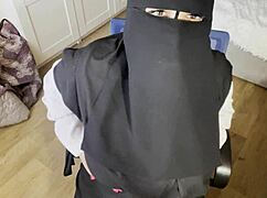 What secrets hide behind those beautiful eyes as the hijab-wearing Turkish wife teases in pantyhose?