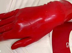 look at this latex goddess spanking herself and masturbating hard