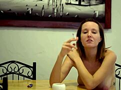 mmm cheeky neighbor babe smokes while teasing her big tits 😏💨