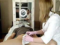 a beautiful woman shaves her big cock guy's pubis and anus smooth while he's bent over on all fours fetish style