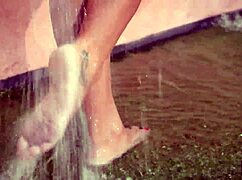 big tits model lucy li fingers her wet pussy to orgasm under outdoor waterfall