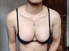 Hey, watch this big tit Asian shemale stroke her cock to cumshot!