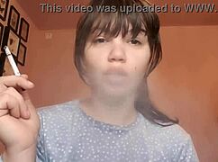 Close-Up Latina Femdom Slave Smokes with Glossy Big Lips Piercing Tongue