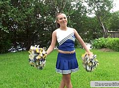 Busty Cheerleader Teases with Outdoor Boob Flash