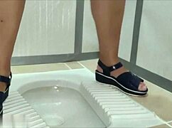 hey guys, this bbw milf heads outside for some wild public bathroom pissing fun...
